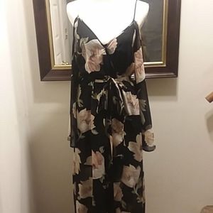 A spaghetti strapped, off shoulder floral dress